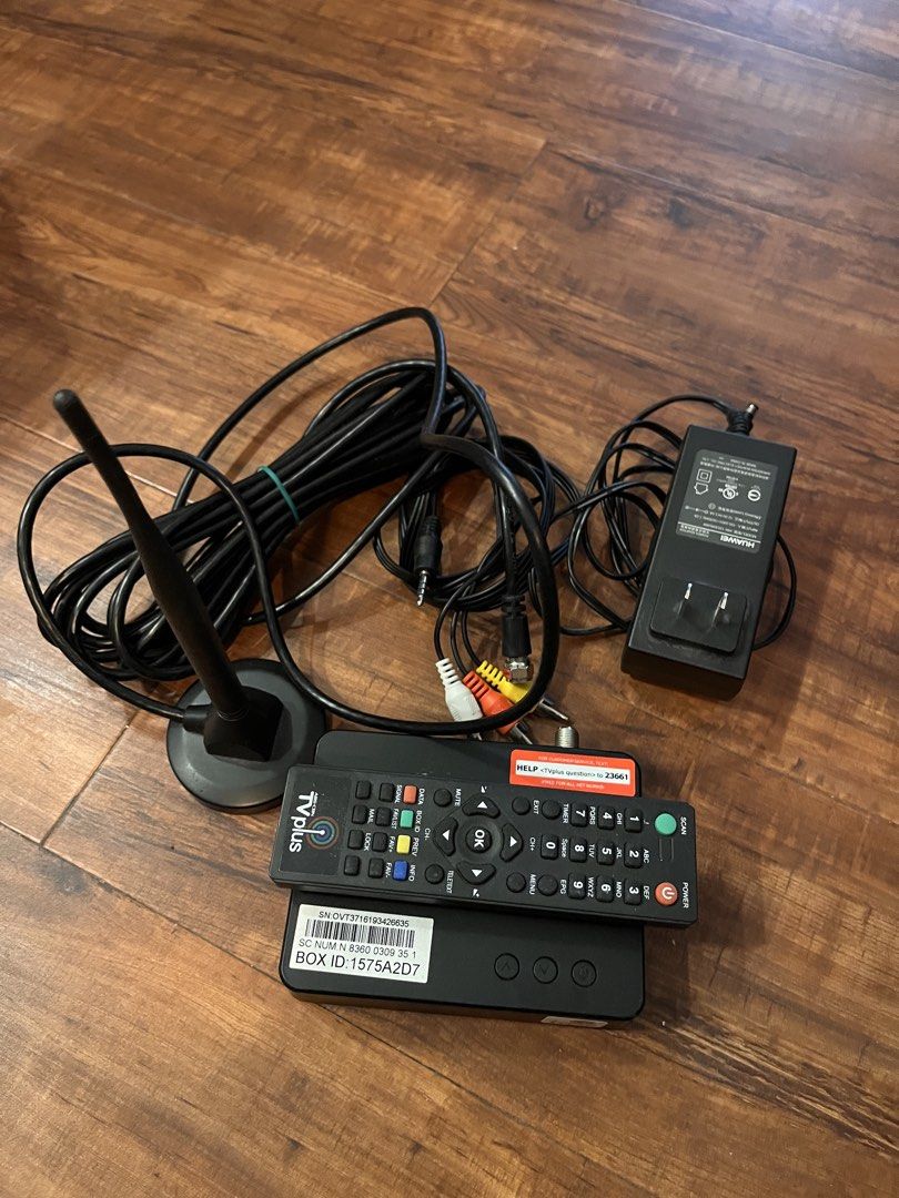 TVPlus Digital Receiver Box with Remote and Accessories (Category: TV Parts & Accessories) located in Taguig. Submitted by kscsantos (Listing ID 1464011505, Image 2). Description: - TVPlus Digital Receiver Box - Complete set includes: Box, Remote Control, Antenna, Power Adapter, AV Cables - All items shown in photos - Ready for easy setup - Enjoy clear digital TV channels.