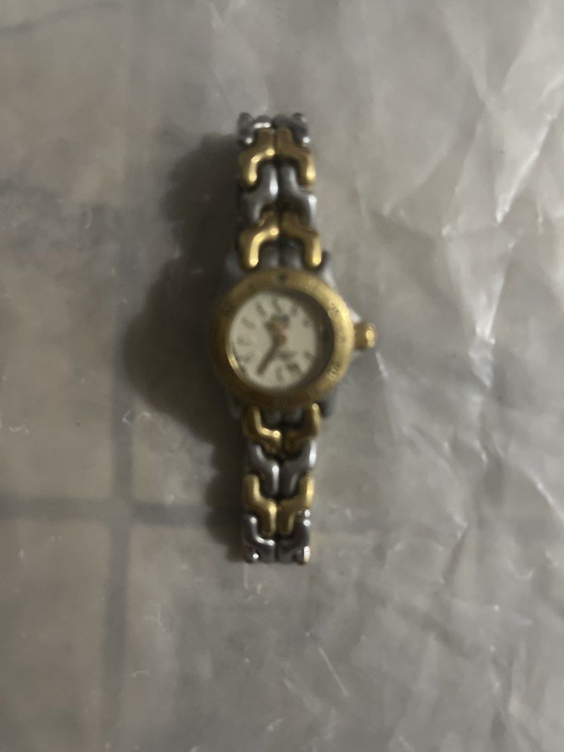 Two-tone ladies watch (Category: Women's Watches) located in Dasmarinas. Submitted by ajmendoza4 (Listing ID 1464117092, Image 1). Description: TAG Heuer Cell Series S95.708 SS Ivory Quartz Watch Silver Gold 0395TAG HEUER Original Price: 1022$.