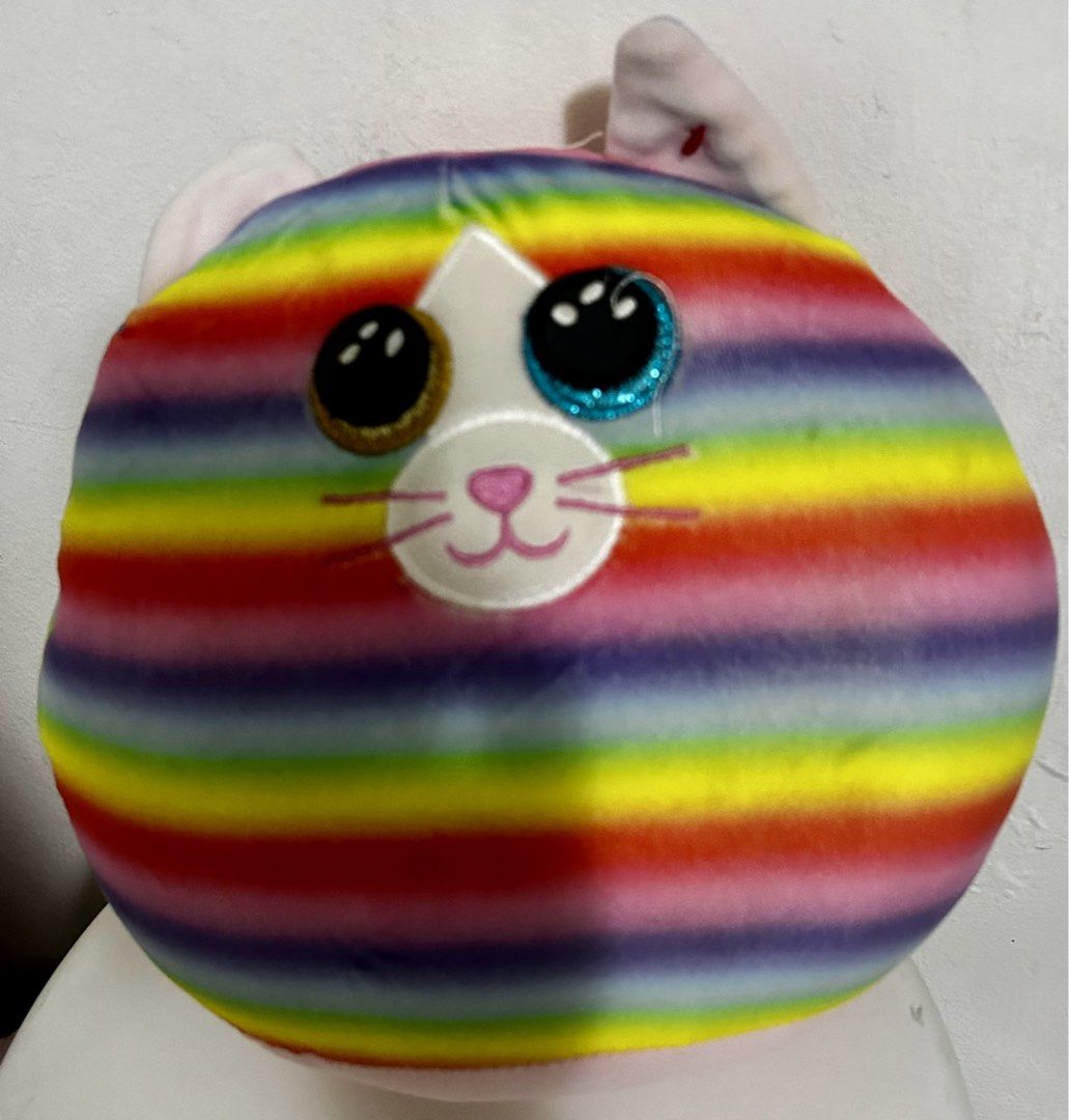 Ty Beanie Boos Rainbow Cat Plush Toy (Category: Plushies & Soft Toys) located in Pasig City. Submitted by royalregistry (Listing ID 1464070309, Image 1). Description: - Adorable rainbow cat plush toy - Features big sparkly eyes and a sweet smile - Dimensions: Approximately 22cm wide x 21cm tall - Made with soft, cuddly material - Ideal gift for kids or a must-have for collectors .