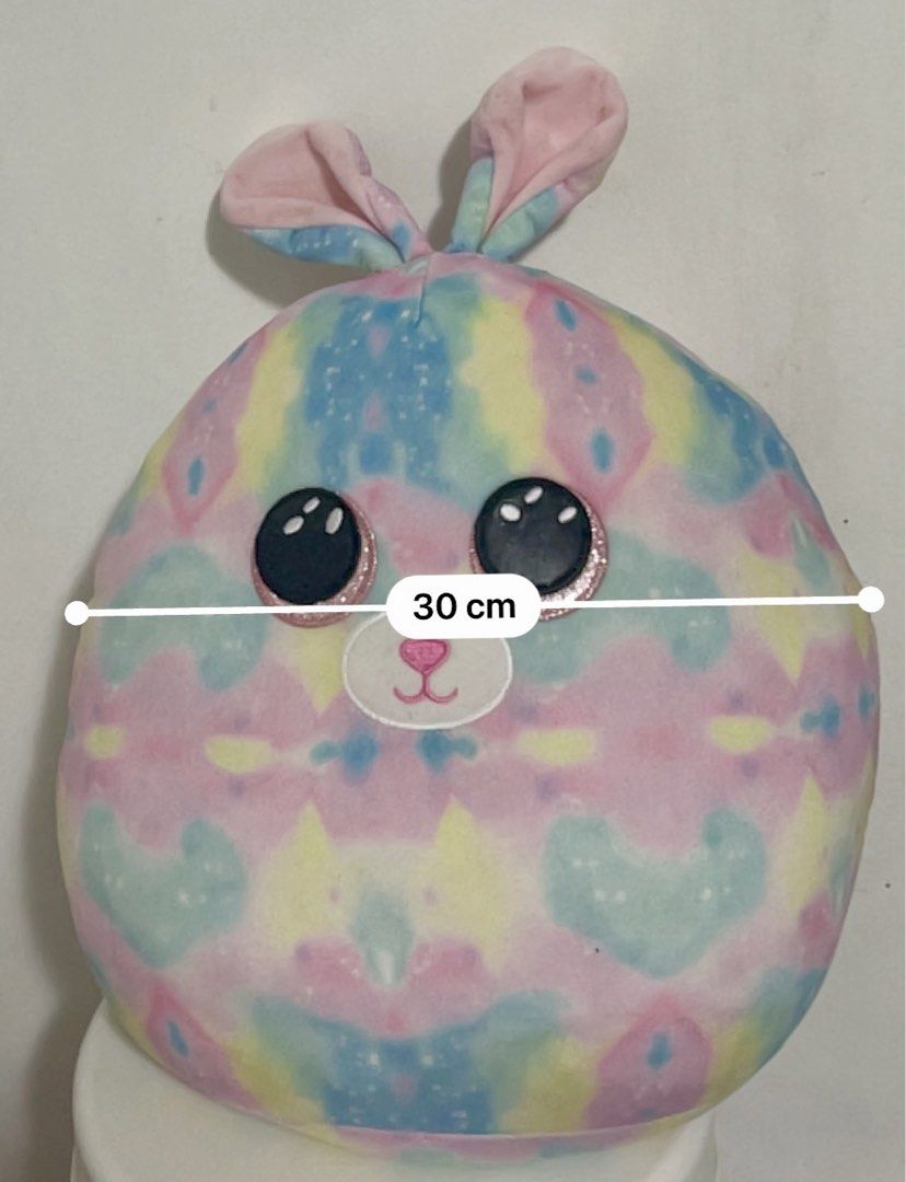 Ty Squishmallow Bunny Plush Toy 30cm (Category: Plushies & Soft Toys) located in Pasig City. Submitted by royalregistry (Listing ID 1464070516, Image 2). Description: - Adorable pastel tie-dye bunny plush - Features glittery eyes for extra sparkle - Dimensions: Approximately 30cm wide and 34cm tall. Biggest size - Super soft and squishy, perfect for cuddling - Authentic Ty product .