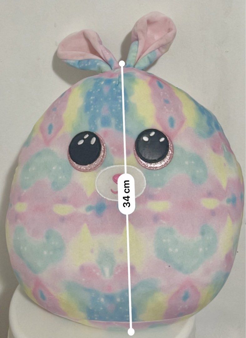 Ty Squishmallow Bunny Plush Toy 30cm (Category: Plushies & Soft Toys) located in Pasig City. Submitted by royalregistry (Listing ID 1464070516, Image 3). Description: - Adorable pastel tie-dye bunny plush - Features glittery eyes for extra sparkle - Dimensions: Approximately 30cm wide and 34cm tall. Biggest size - Super soft and squishy, perfect for cuddling - Authentic Ty product .