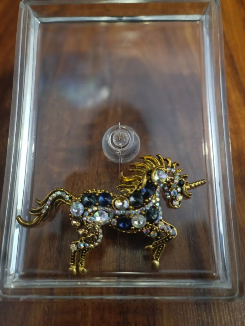 Unicorn with semi precious stone brooch (Category: Other Accessories) located in Dasmarinas. Submitted by solstice.style (Listing ID 1463939932, Image 1). Description: unicorn brooch with semi precious stone -480 plus sf.