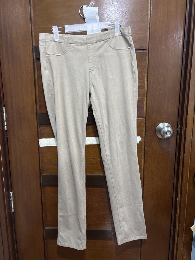 Uniqlo Beige Stretch Pants XL (Category: Jeans) located in Mandaluyong City. Submitted by clothescarousel (Listing ID 1464098388, Image 1). Description: - Uniqlo Beige Pants - Size: XL - Material: Comfortable stretch fabric - Features: Elastic waistband, two back pockets - Fit: Straight leg cut - Occasion: Ideal for casual wear.