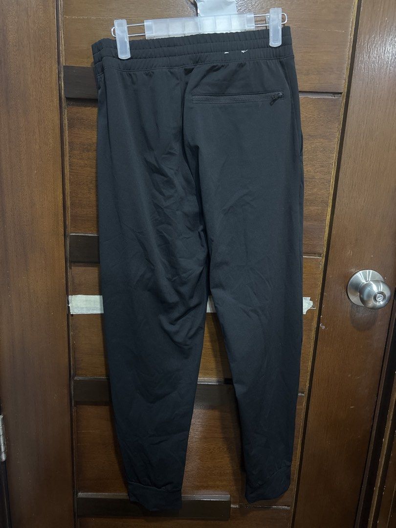 Uniqlo Black Jogger Pants Size S (Category: Other Bottoms) located in Mandaluyong City. Submitted by clothescarousel (Listing ID 1463976255, Image 3). Description: - Uniqlo Black Jogger Pants - Size: S - Elastic waistband with drawstring - Two side pockets - One zippered back pocket - Made in Vietnam - Ideal for casual wear or workouts.