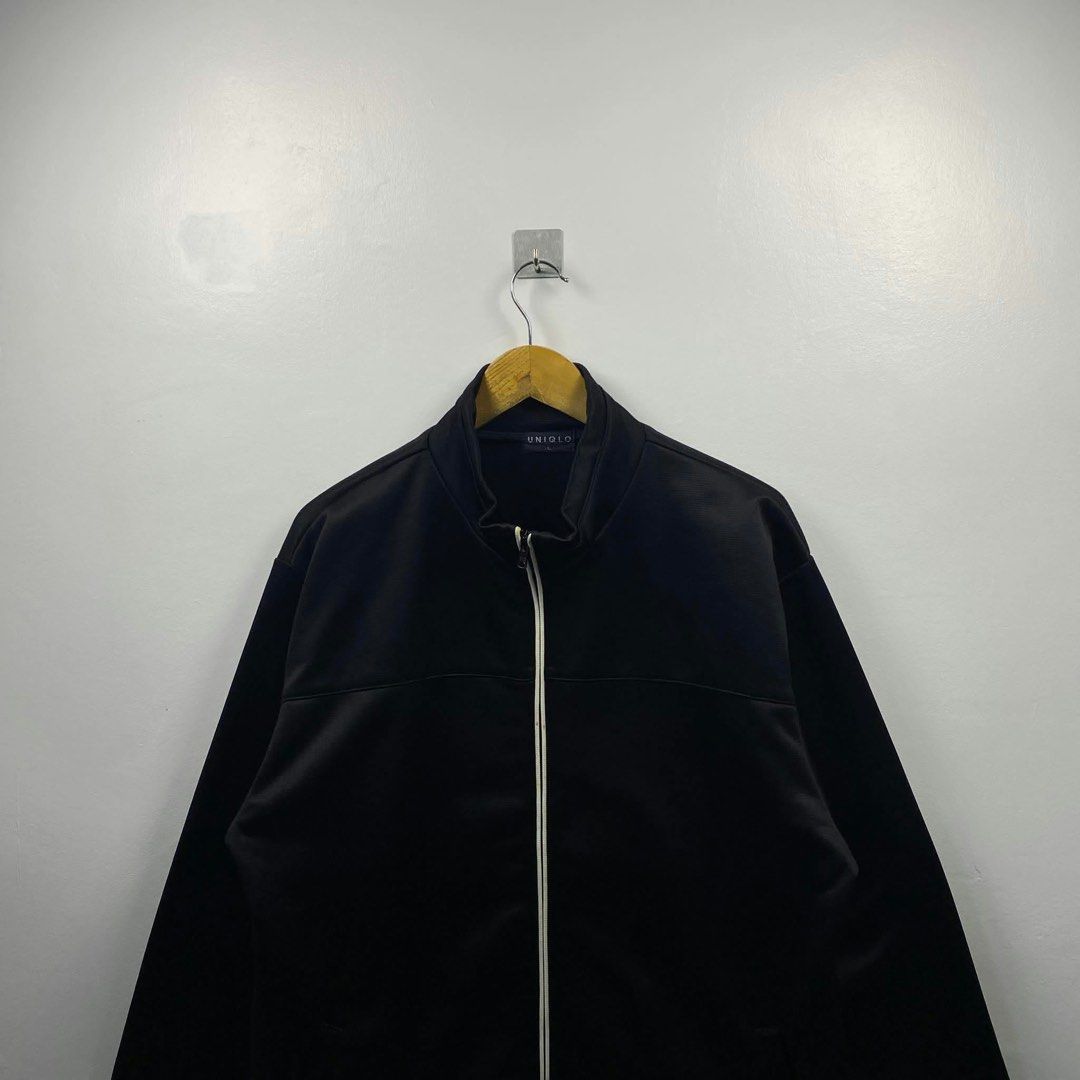 Uniqlo Black Track Jacket Zip Up (Category: Coats, Jackets and Outerwear) located in Manila. Submitted by lee_23 (Listing ID 1464023062, Image 2). Description: Dimes: L 23x26.