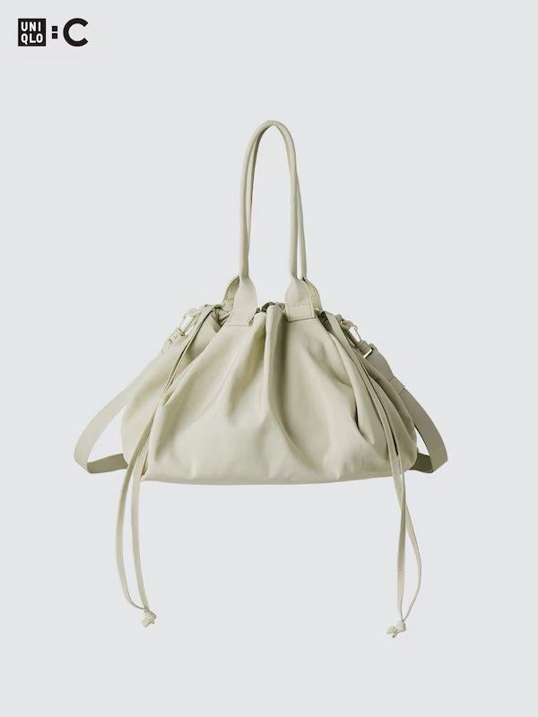 Uniqlo :C Drawstring Bag (Category: Tote Bags) located in Cavite. Submitted by nikka.am (Listing ID 1463957317, Image 2). Description: - color: cream - with removable strap - super spacious bag - bought from uniqlo japan .