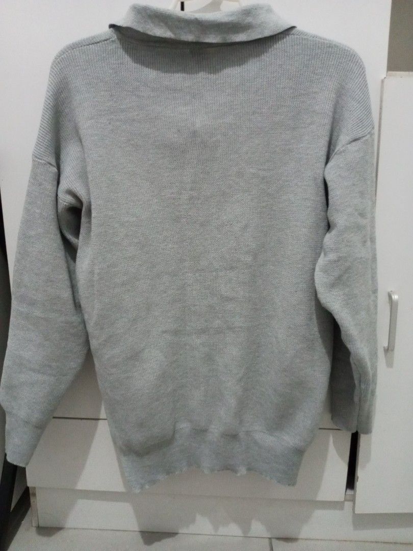 Half Zip Collared Knit Sweater (Category: Coats, Jackets and Outerwear) located in Manila. Submitted by lofiley (Listing ID 1464029524, Image 2). Description: - Orig price 650 - Grey and blackknit sweater - Half-zip and collar design - Long sleeves with ribbed cuffs - Ribbed - Versatile for zipping up or down - Ideal for casual outfits and layering.