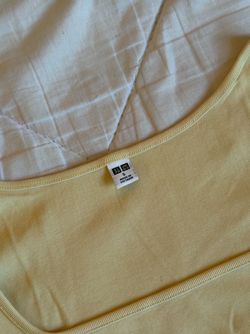 Uniqlo Yellow Square Neck Cropped Top (Category: Sleeveless) located in Manila. Submitted by dndclothing (Listing ID 1463967092, Image 2). Description: ⊹ brand: uniqlo ⊹ doesnt fit me anymore ⊹ size s on tag ⊹ cropped.