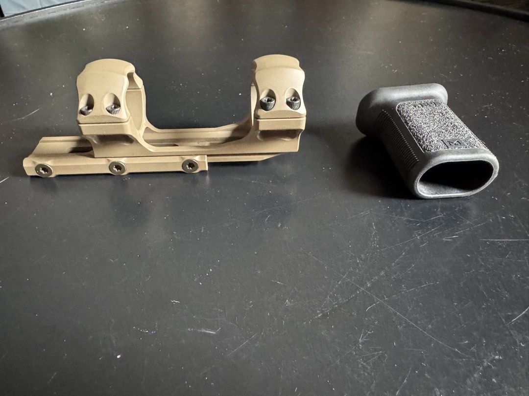 UTG Scope Mount & BCM Vertical Grip (Category: Combat Sports) located in Quezon City. Submitted by beast_123 (Listing ID 1463993934, Image 2). Description: Selling the following accessories, both in good used condition: • UTG AIR31850D Scope Mount 30mm Diameter 50mm Offset – FDE/Tan • BCM Mlok Vertical Grip – Black • Both are used but well maintained • Please refer to the actual photos for cosmetic condition • Selling as-is • Can be sold individu