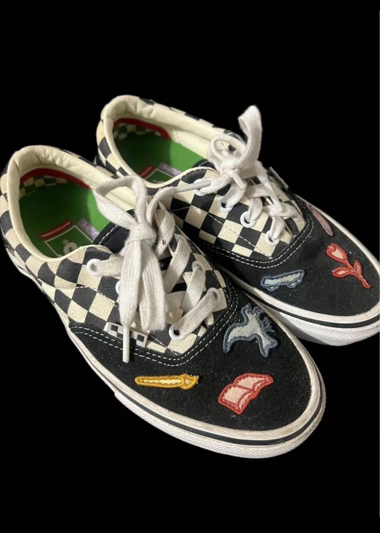 Van's shoes (Category: Casual Shoes) located in Manila. Submitted by rubymielbona (Listing ID 1464021401, Image 1). Description: - Brand: Vans - Model: Era (Checkerboard with Patches) - Design: Classic checkerboard pattern with embroidered patches (rose, sun, rainbow, etc.) - Color: Black, White, and multicolor patches - Size: US Men's 3.5 / UK 2.5 / EUR 34.5 / CM 21.5 - Features: Iconic Vans waffle sole, lace-up closure Vans limited edition 1200