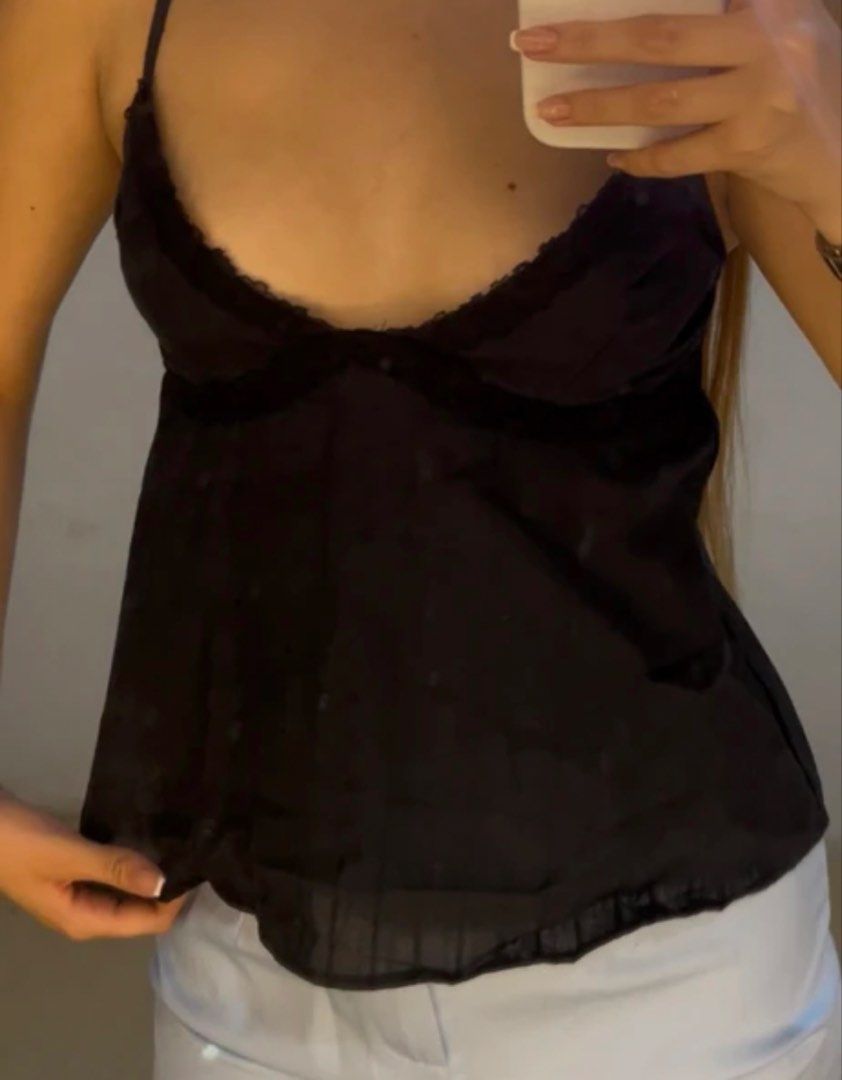 Vietnamese Black Linen Cami Top (Category: Sleeveless) located in Manila. Submitted by glossywife (Listing ID 1464082161, Image 1). Description: Size xs Bought it from a stall in Vietnam Similar to Brandy Melville Only tried it on, never worn out Adjustable straps Rfs: decluttering Mop: gcash / bank transfer Mod: grabexpress / j&t/ lalamove Brandy Melville Zara Isa the label H&M Cotton On Stradivarius Phia Hollister Subdued John Galt Miu the labe