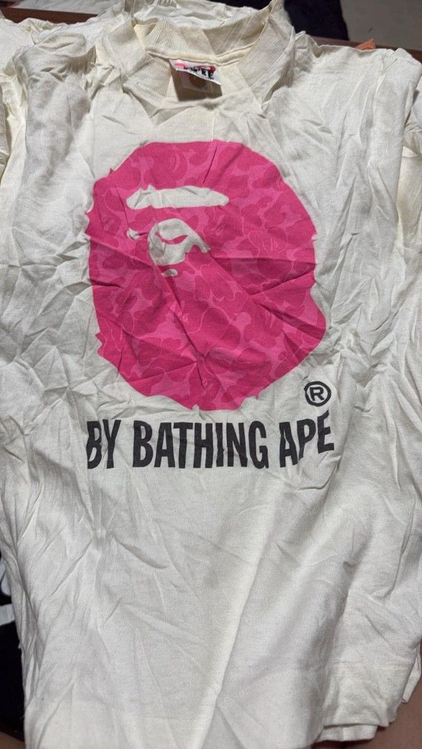 VINTAGE AAPE TAGS PINK CAMOU (Category: Shirts) located in Manila. Submitted by troyyyy_03 (Listing ID 1463960341, Image 1). Description: SMALL LADIES AS NEW NEED WASH ONLY NO ISSUE PAUNAHAN NALANG DROP OFFER PM ME .