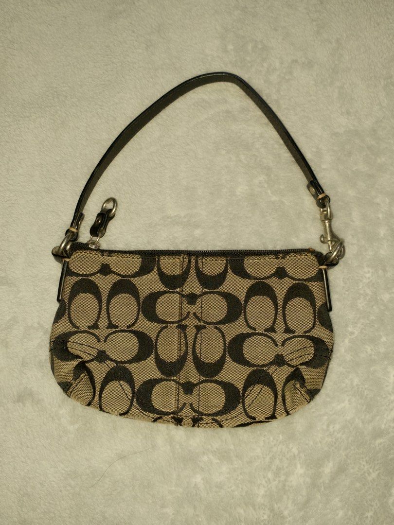 vintage auth coach kili bag/ wrislet (Category: Purses & Pouches) located in Manila. Submitted by thelittlearchiveofelle (Listing ID 1464052937, Image 1). Description: vintage Kili bag with normal signs of use will not entertain low ballers, last price posted! RUSH SALE!!.