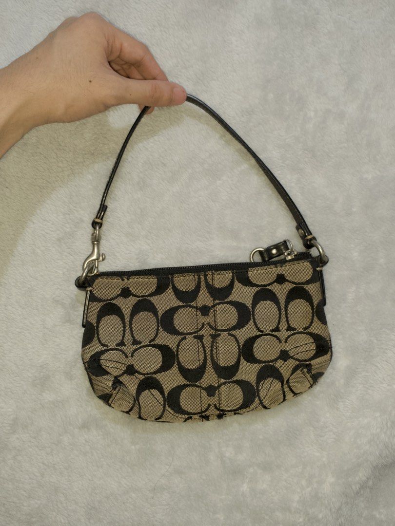 vintage auth coach kili bag/ wrislet (Category: Purses & Pouches) located in Manila. Submitted by thelittlearchiveofelle (Listing ID 1464052937, Image 2). Description: vintage Kili bag with normal signs of use will not entertain low ballers, last price posted! RUSH SALE!!.