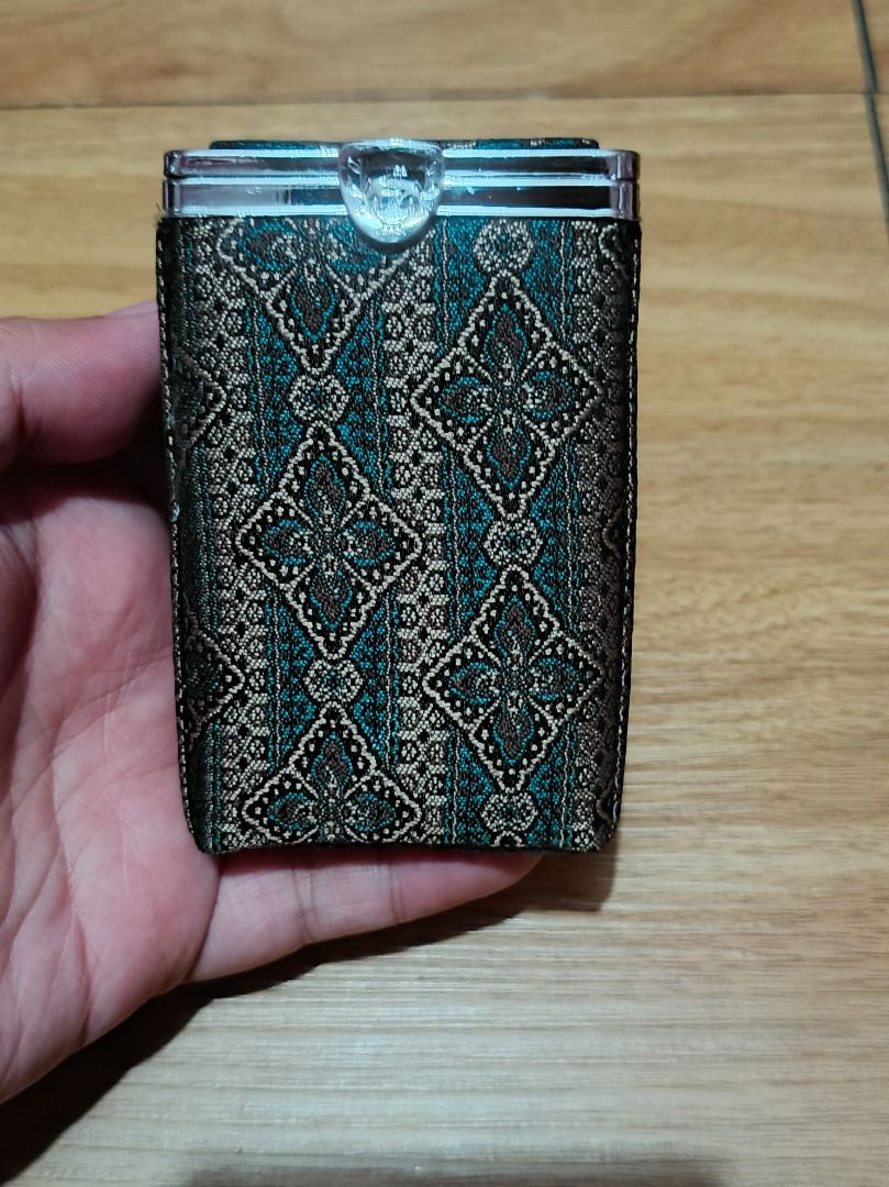 Vintage Brocade Cigarette Case Holder (Category: Everything Else Others) located in Makati City. Submitted by nyxhemera26 (Listing ID 1464125005, Image 3). Description: Vintage Brocade Cigarette Case Holder - Beautiful teal and gold brocade fabric - Secure metal clasp closure - Compact size, perfect for pockets or purses - Keeps cigarettes protected and stylish - Unique vintage find.