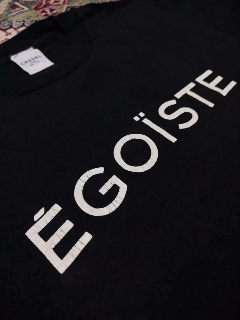 Vintage Chanel Egoiste Tee (Category: Luxury Apparel) located in Lucena. Submitted by 4301thriftklub (Listing ID 1464044468, Image 3). Description: When Chānel released its Égoïste men's fragrance campaign in 1990, it released a limited quantity of these remarkable t-shirts. Prokofiev's iconic "Dance of the Knights" composition from the ballet Romeo and Juliet inspired the revolutionary 30-second commercial, directed by Jean-Paul Goude and costin