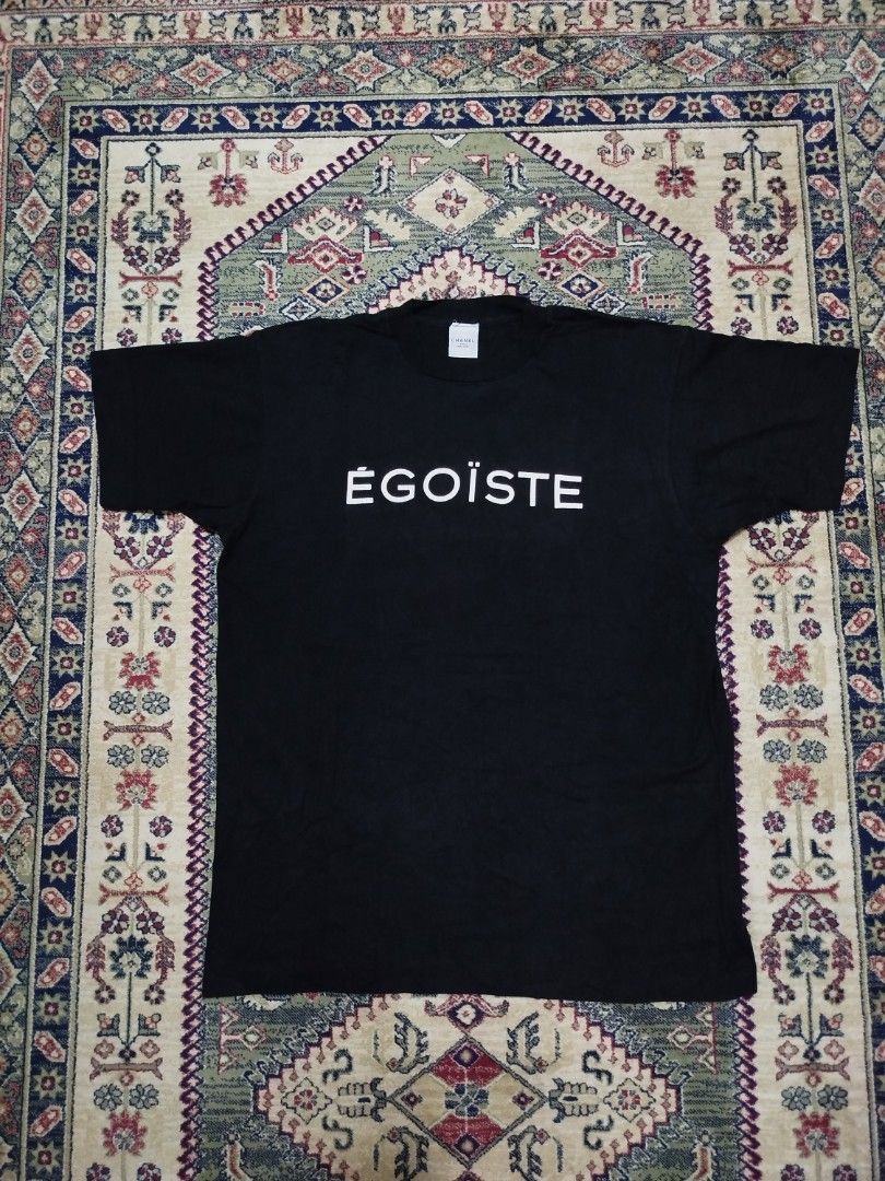 Vintage Chanel Egoiste Tee (Category: Luxury Apparel) located in Lucena. Submitted by 4301thriftklub (Listing ID 1464044468, Image 1). Description: When Chānel released its Égoïste men's fragrance campaign in 1990, it released a limited quantity of these remarkable t-shirts. Prokofiev's iconic "Dance of the Knights" composition from the ballet Romeo and Juliet inspired the revolutionary 30-second commercial, directed by Jean-Paul Goude and costin