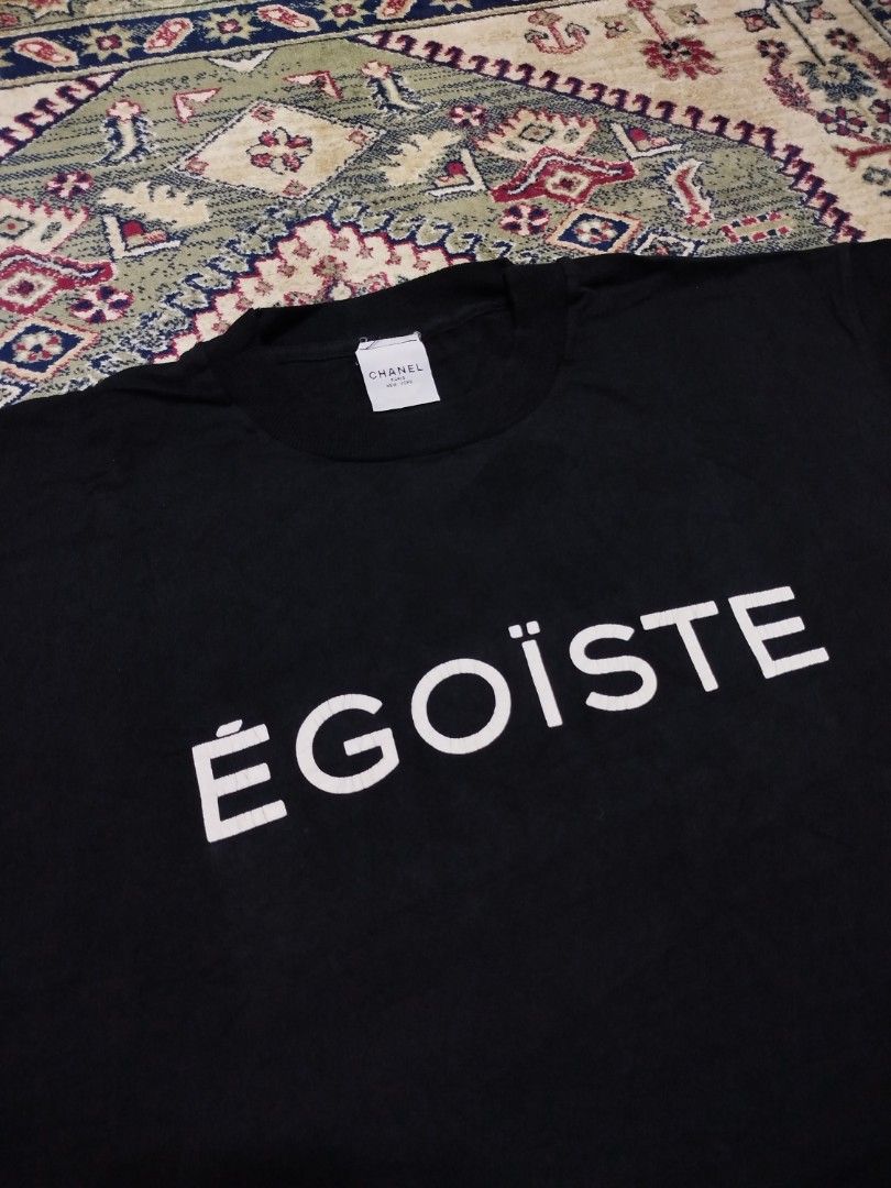 Vintage Chanel Egoiste Tee (Category: Luxury Apparel) located in Lucena. Submitted by 4301thriftklub (Listing ID 1464044468, Image 2). Description: When Chānel released its Égoïste men's fragrance campaign in 1990, it released a limited quantity of these remarkable t-shirts. Prokofiev's iconic "Dance of the Knights" composition from the ballet Romeo and Juliet inspired the revolutionary 30-second commercial, directed by Jean-Paul Goude and costin