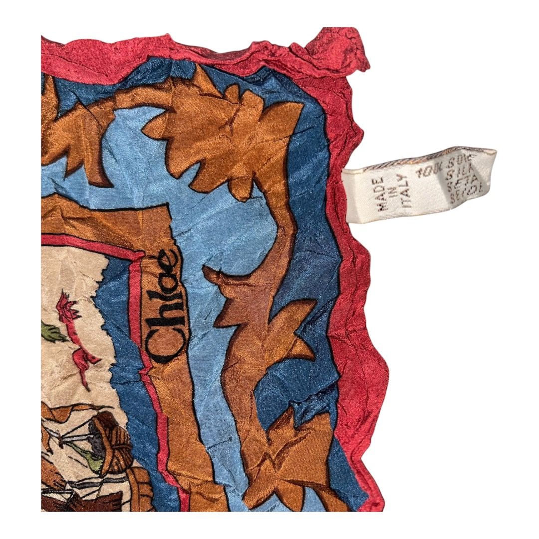 Vintage Chloe Silk Scarf (Category: Scarves) located in Sorsogon. Submitted by wayne.japon (Listing ID 1464058861, Image 3). Description: - Authentic Chloe scarf - 100% Silk - Made in Italy - Design: Blue, brown, and red floral pattern - A stylish accessory to elevate your look Excellent condition Authentic Chloe Scarf 9.5/10 No issue 600or Best Offer DM.