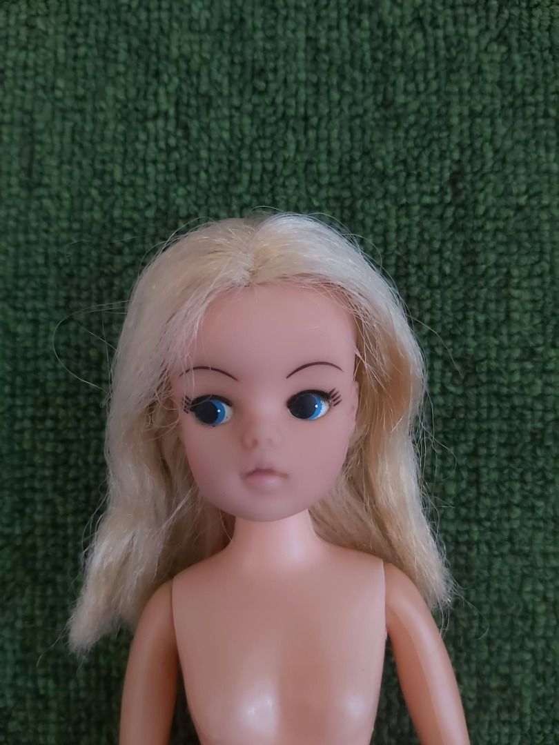 Vintage Funtime Sindy Doll - Second Generation 1977-80 (Category: Action & Battle Toys) located in Manila. Submitted by thepartypeopleph (Listing ID 1463960149, Image 2). Description: - Vintage Funtime Sindy Doll - Second Generation (1977-1980), Pedigree UK released, Made in HK - Hair needs conditioning and some strands missing. Includes a retro-patterned dress with lace trim - Good vintage condition - Perfect for collectors and enthusiasts SF to