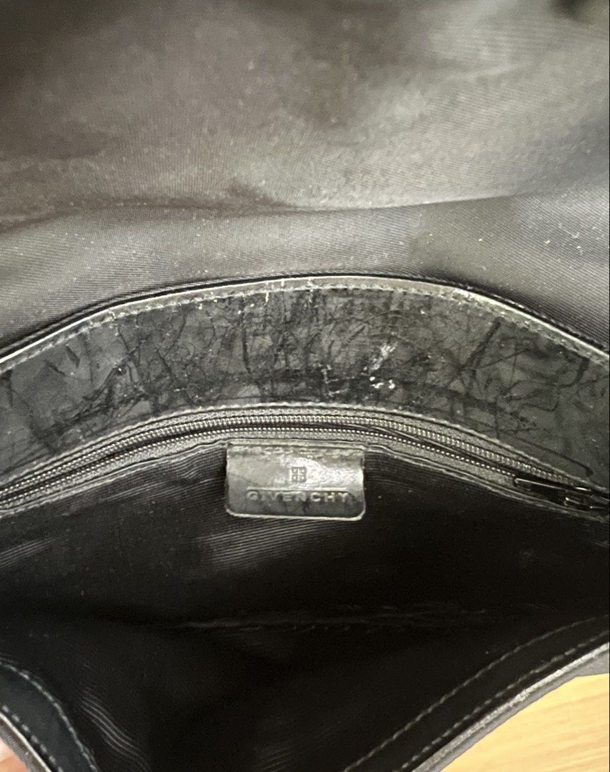 Vintage Givenchy Black Nylon Shoulder Bag (Category: Luxury Bags & Wallets) located in Manila. Submitted by pearlt455 (Listing ID 1463981725, Image 3). Description: - Authentic Vintage Givenchy black nylon shoulder bag - Y2K-style shoulder bag - Iconic Givenchy logo clasp closure - Interior zippered pocket for essentials - Condition: Used-wearable (pls see pics) .