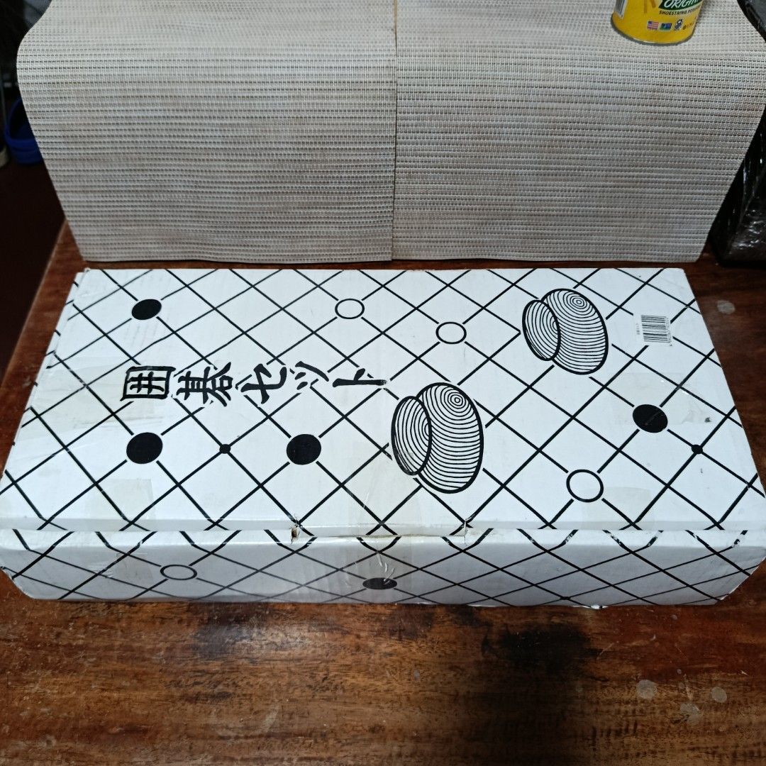 Vintage Go game set (Category: Board Games & Puzzles) located in Las Pinas. Submitted by 84vintage (Listing ID 1463993080, Image 2). Description: Another Christmas Gift idea. Makes a great gift for someone who loves vintage board games. Bnew in box. just put some wrapper and it's a GO. (pun intended) Sealed foldable solid wood board with 2Pcs cauldron for the stones (or go-ishi in Japanese). In it's original Box/Packaging..