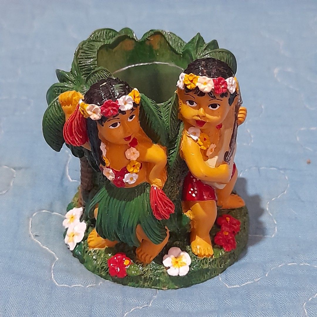 Vintage Hawaii Hula Dancer Figurine (Category: Figurines & Statues) located in Bocaue. Submitted by marajapansurplus (Listing ID 1463973592, Image 1). Description: - Adorable vintage figurine from Hawaii. - Features two charming hula dancers. - One dancer is playing a ukulele. - Set on a tropical base with palm trees and flowers. - Made in Taiwan. - Ideal for collectors. - Adds a fun, tropical vibe to any space. - Great as a unique decor piece..