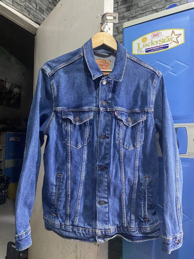 Vintage Levis Denim Trucker Jacket (Category: Coats, Jackets and Outerwear) located in Rizal. Submitted by kenrick_2003 (Listing ID 1464048079, Image 2). Description: Levi's Denim Jacket May 20, 1987 Tag label Blue Denim the Trademark of 1987 Design Size: Medium Fabric: 100% Heavyweight Denim Cotton Measurements Width: 22 Inches Body Length: 27 Inches Sleeve Length: 25 Condition: Brandnew Color rate: Excellent Condition Bought in U.S San Francisc
