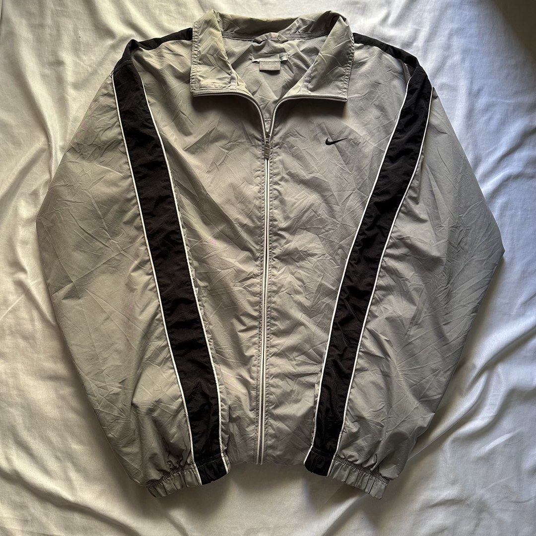 Vintage Nike Early 2000s 2 Lines Windbreaker with Back Nike Script (Category: Hoodies) located in Quezon City. Submitted by notmhico (Listing ID 1464027001, Image 1). Description: .