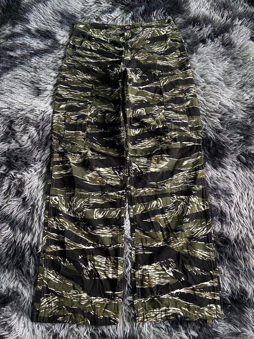 Vintage Tiger Camouflage Utility Cargo Pants (Category: Jeans) located in Baao. Submitted by prettysixtythrift_17 (Listing ID 1464021939, Image 1). Description: ▪️Waistline: 30 adjustable buckle ▪️Length: 40 ▪️Hem: 9 ▪️Hips: 17 ▪️Leg Thigh: 13 ▪️Rise: 11 ▪️Inseam: 30.
