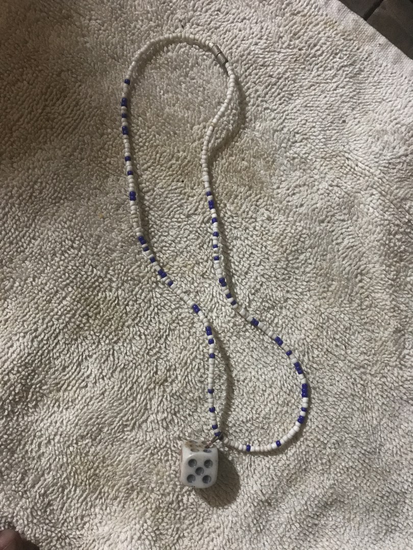 Vintage white dice Necklace (Category: Necklaces) located in Marikina City. Submitted by theconstantdeclutterer (Listing ID 1464092586, Image 2). Description: Vintage White beaded short necklace with white dice pendant with red blue accents. Order now! *Manage expectations for vintage Preloved item. .