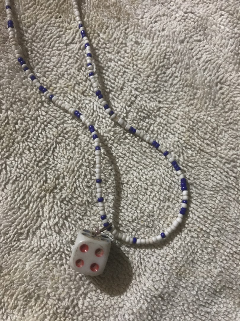 Vintage white dice Necklace (Category: Necklaces) located in Marikina City. Submitted by theconstantdeclutterer (Listing ID 1464092586, Image 1). Description: Vintage White beaded short necklace with white dice pendant with red blue accents. Order now! *Manage expectations for vintage Preloved item. .