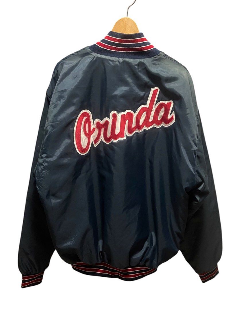 Vintage Windless All Stars 1998 Bomber Jacket (Category: Coats, Jackets and Outerwear) located in San Pedro. Submitted by lifebeginsaftercoff33 (Listing ID 1464065466, Image 3). Description: - Vintage Charles Newton bomber jacket - 'All Stars 1998' embroidered on front This is a vintage dark nylon snap-front bomber jacket featuring red and white striped ribbed trim and “ALL STARS 1998” chest embroidery. - 'Orinda' embroidered across the back - Qu