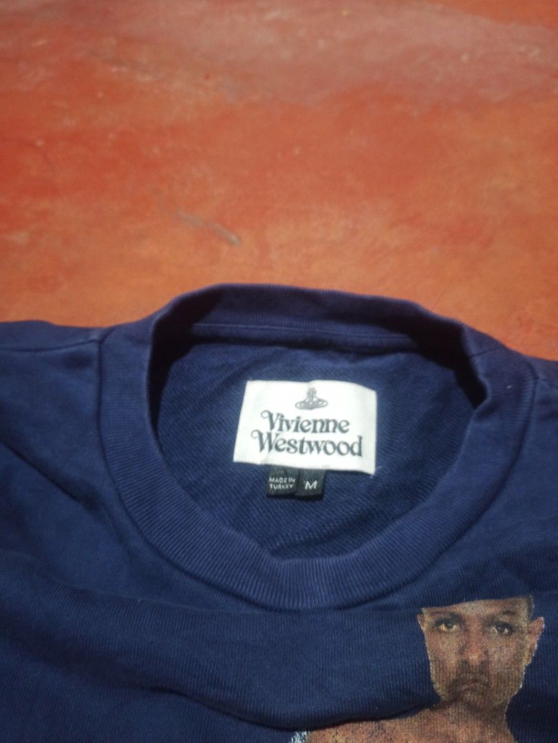 vivianne westwood (Category: Announcements) located in Davao. Submitted by thriftnisayre (Listing ID 1463995866, Image 3). Description: vivianne Crewneack excellent condition color rate 9/10 issue crack laser prent navy blue color dimes 21/27.