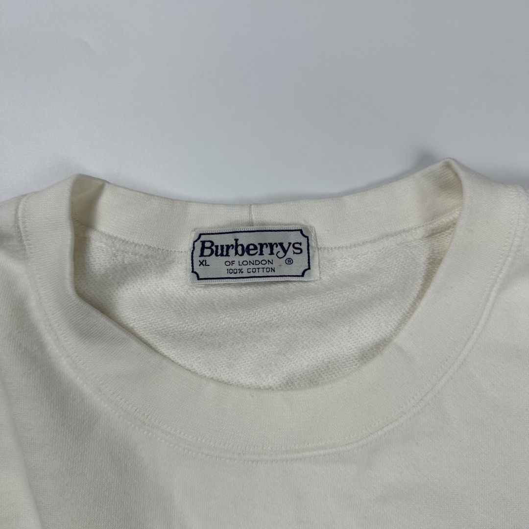 VTG Burberrys Embroidered Script Logo Sweatshirt (Category: Luxury Apparel) located in Cavite. Submitted by second_story_ph (Listing ID 1464102543, Image 3). Description: VTG Burberrys Embroidered Script Logo Sweatshirt Size: XLarge Dimension: 24” Width / 29” Length Condition: Excellent.