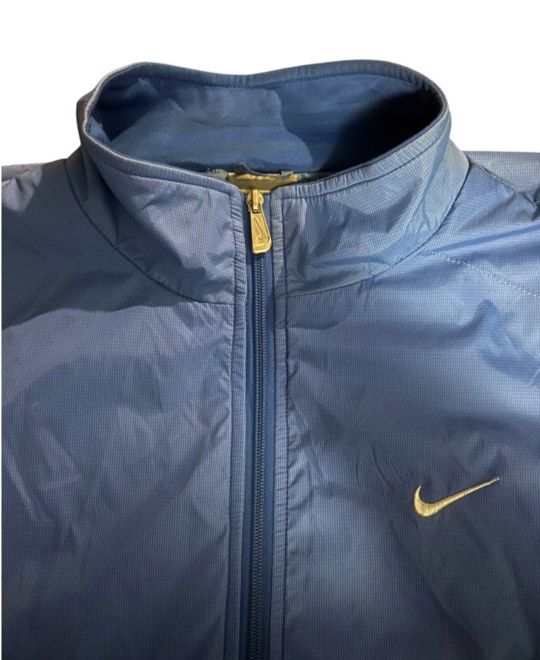 VTG Nike Blue Water Resistant Track Jacket (Category: Coats, Jackets and Outerwear) located in San Pedro. Submitted by lifebeginsaftercoff33 (Listing ID 1464047618, Image 2). Description: - Vintage Blue Nike water resistant track jacket - Can be unisex - Full zip closure - Classic Nike swoosh logo (Embroiderd) on chest - Logo on the back (Embroiderd) - Two zip front pockets & 1 inside pocket - Elasticated cuffs and hem - Ideal for casual wear or 