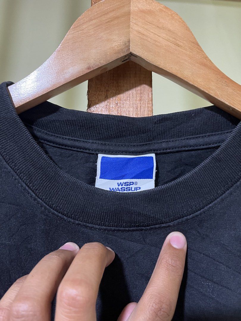 Wassup T-shirt Black (Category: Blouses) located in Carmen, Agusan del Norte. Submitted by all.en.thrifts (Listing ID 1464012179, Image 2). Description: - Black t-shirt with 'wassup' logo on front - WSP Wassup tag - Small blue 'wassup' tag on side - Perfect for casual wear.
