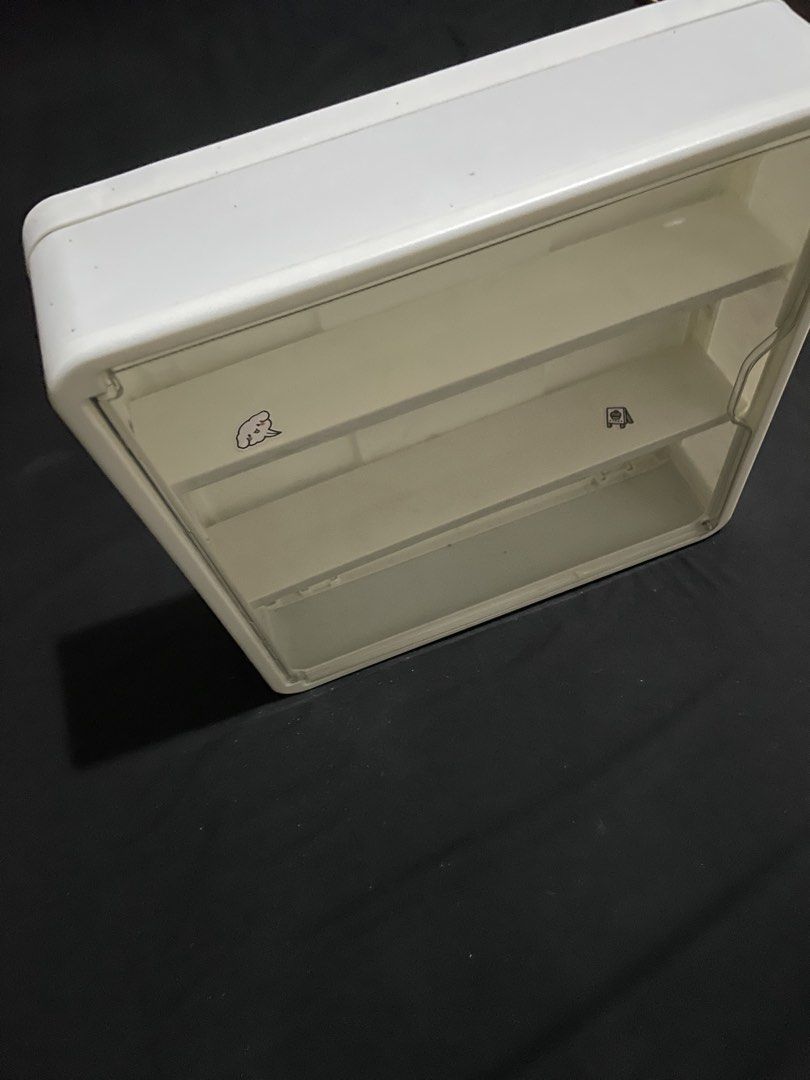 White 3-Tier Storage Box with Clear Door (Category: Storage Boxes & Baskets) located in Plaridel. Submitted by julien_stuff (Listing ID 1464076394, Image 2). Description: RFS: decluttering/need to let go - White storage box with three shelves - Clear front door that opens - Decorated with small, cute animal icons on each shelf - Ideal for organizing small items - Helps keep your desk or vanity tidy.