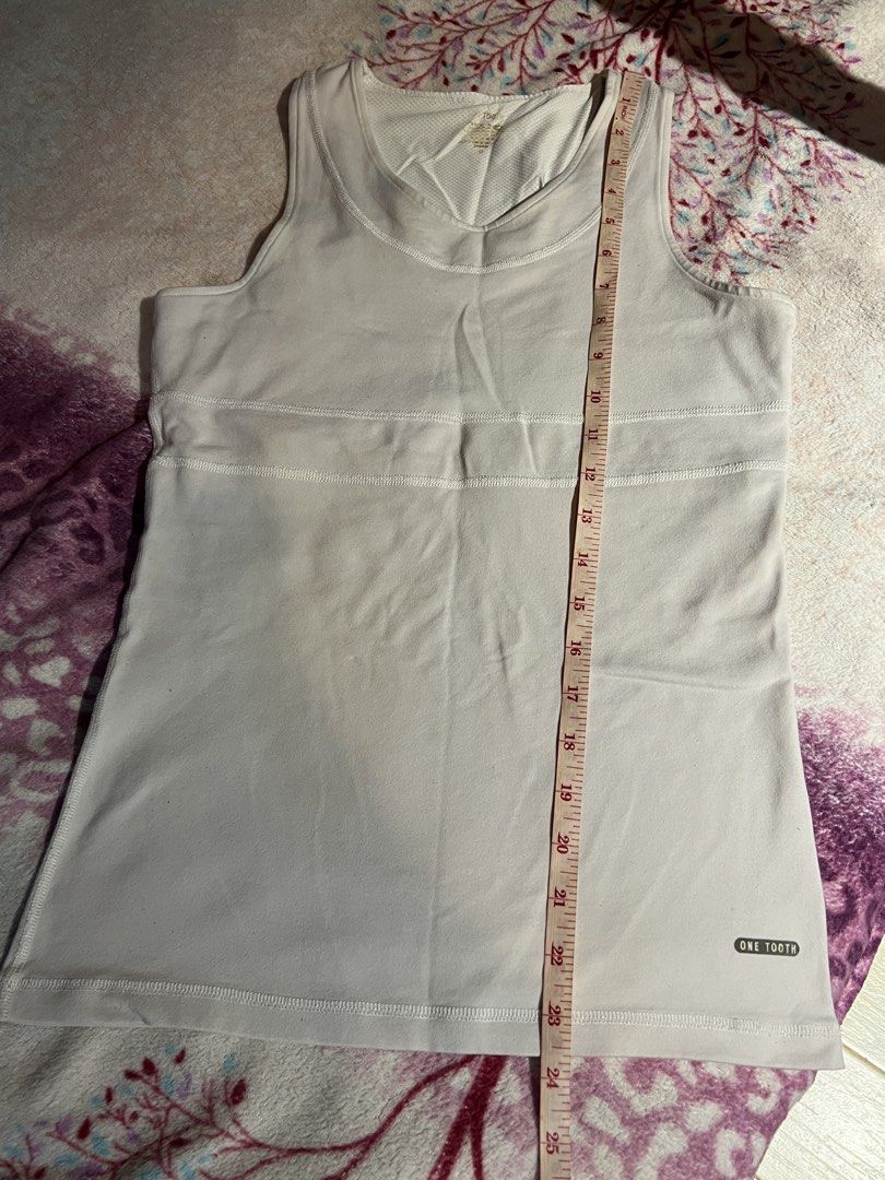 White Athletic Tank Top (Category: Sleeveless) located in Manila. Submitted by nissi.b (Listing ID 1463990685, Image 3). Description: - still in very good condition - good for xs to s body type - dm for ww pics - loc: sta. mesa, manila.