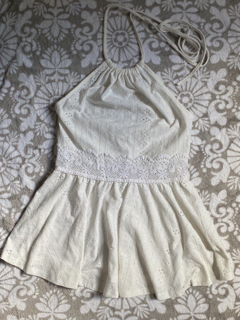 White Eyelet Halter Top with Lace Trim (Category: Sleeveless) located in Manila. Submitted by mysticcat15 (Listing ID 1463940234, Image 2). Description: rfs:decluttering mop:gcash mod:jnt - Ties at the neck - Ideal for summer or beach vacations - Pairs well with shorts or skirts.