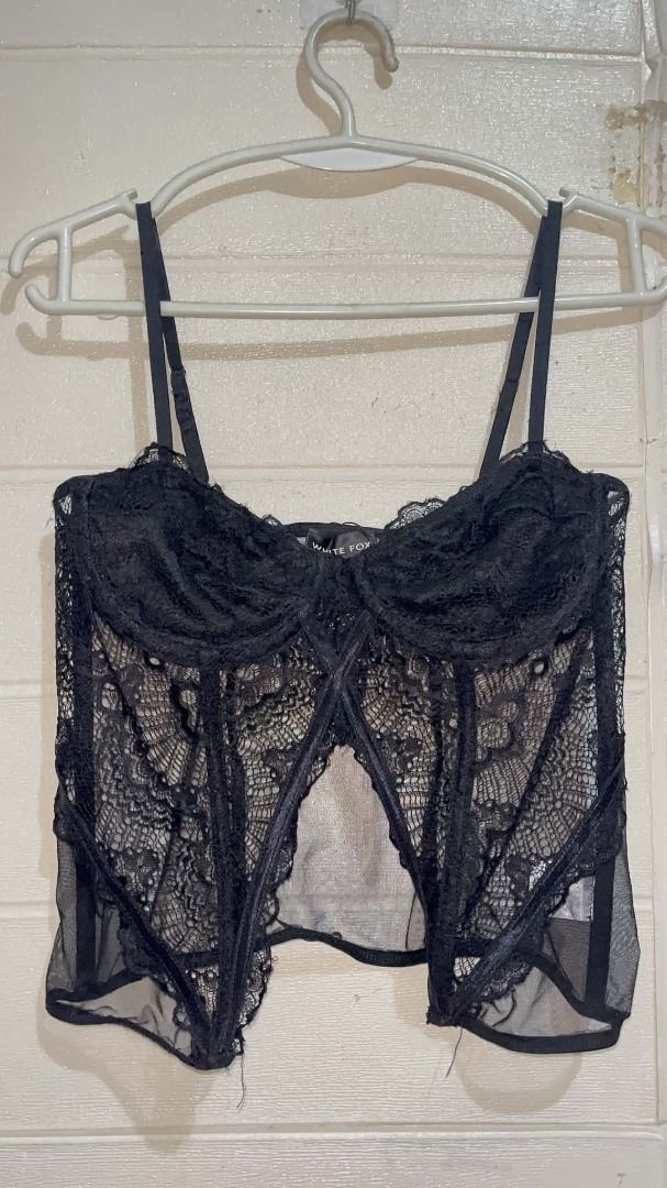 White Fox Black Lace Corset Top Bustier Adjustable Strap (Category: Sleeveless) located in Cavite. Submitted by cvshops (Listing ID 1464049665, Image 2). Description: Buy 2 items, get a freebie! Xs to s-med Available delivery and meetup for all items P50 lang fixed SF Luzon 1st photo as inspo only para makita style ww - Black lace corset top from White Fox - Features adjustable straps - Hook-and-eye closure at the back - Sheer lace detailing thro
