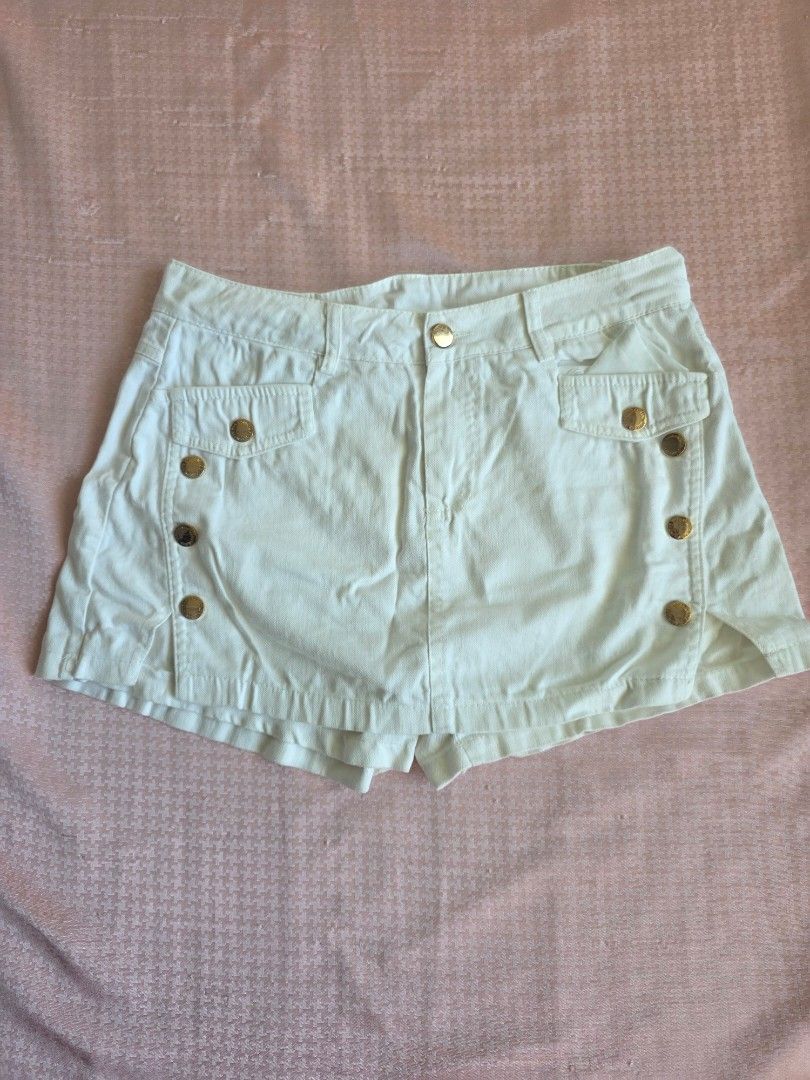 White High-Waisted Sailor Button Shorts (Category: Shorts) located in Manila. Submitted by findsbynie (Listing ID 1463947518, Image 1). Description: - For 4ft and up - 28 waistline - Cute white shorts - High-waisted design - Sailor-style button detail on the front - Two functional back pockets - Ideal for summer outfits - Versatile and easy to pair with various tops.