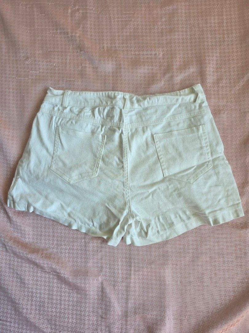 White High-Waisted Sailor Button Shorts (Category: Shorts) located in Manila. Submitted by findsbynie (Listing ID 1463947518, Image 2). Description: - For 4ft and up - 28 waistline - Cute white shorts - High-waisted design - Sailor-style button detail on the front - Two functional back pockets - Ideal for summer outfits - Versatile and easy to pair with various tops.