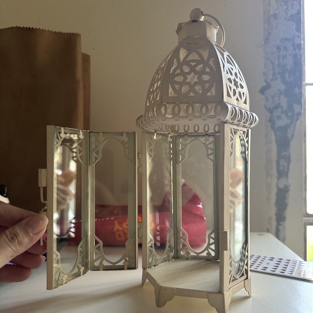 White Metal Decorative Lantern with Glass Panels (Category: Lighting) located in Kawit. Submitted by wevibevintage (Listing ID 1463980502, Image 2). Description: Glass 10inches.