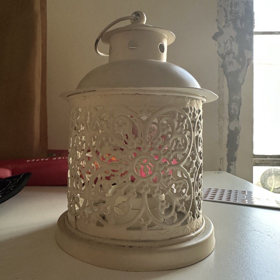 White Metal Lantern with Intricate Cutout Design (Category: Lighting) located in Kawit. Submitted by wevibevintage (Listing ID 1463980956, Image 1). Description: 6inches.
