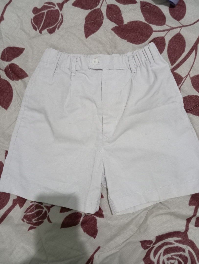 White School Shorts Elastic Waist (Category: Shorts) located in Dasmarinas. Submitted by kei05 (Listing ID 1463952941, Image 2). Description: - Classic white shorts with a pleated design. - Features a comfortable elastic waistband. - Secure button and zip closure at the front. - Versatile for school uniforms or everyday casual wear. - Effortlessly pairs with any top for a complete look. Waistline 22 inches Length 14 inches.