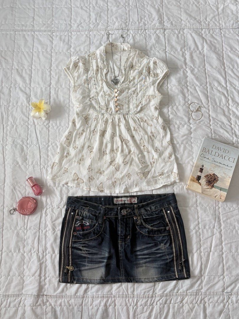 White Sequined Butterfly Top (Category: Sets or Coordinates) located in Butuan. Submitted by saloreia (Listing ID 1464013165, Image 1). Description: size: xs-s - Adorable white top with a charming butterfly print and sparkling sequin details. - Features short sleeves and a convenient button-up front. .