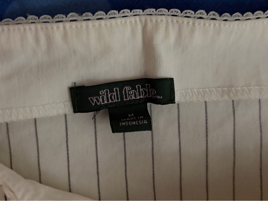 WILD FABLE- Cropped White Vertical Stripped Corset (Category: Others Tops) located in Bolanon. Submitted by youcatsgfff (Listing ID 1464091691, Image 3). Description: - Only Used once. - For Medium Sized Girlies .