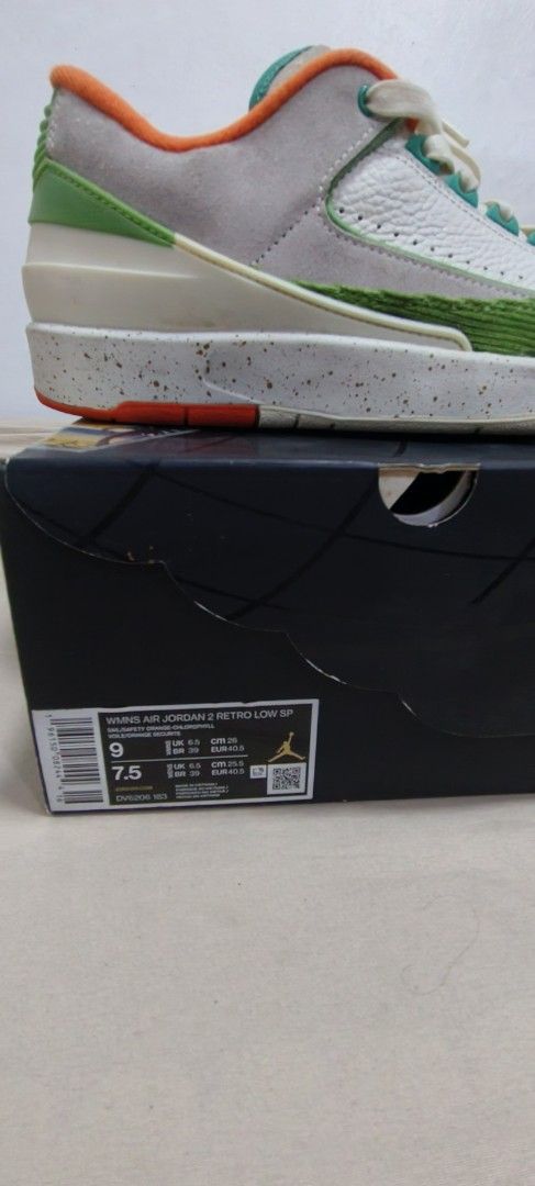 WMNS Air Jordan 2 Titan low (Category: Sneakers) located in Anda. Submitted by Pollit0_77 (Listing ID 1464073084, Image 3). Description: - Authentic WMNS Air Jordan 2 Retro Low SP - Colorway: White with green and orange accents - Size: 9 US Women's 7.5 Men's - Includes original box.