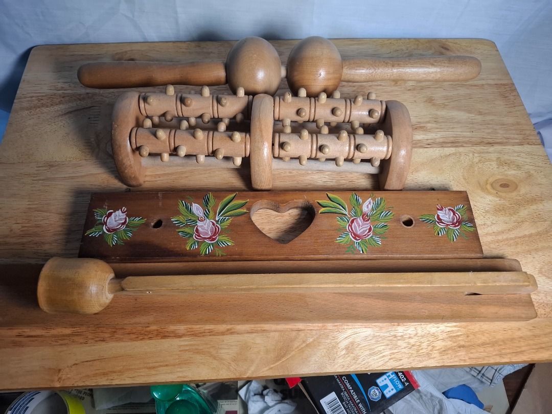 Wooden Body Massager Set with Decorative Holder bundle (Category: Massage Devices) located in Mandaluyong City. Submitted by edward123_andren (Listing ID 1464028604, Image 1). Description: - Wooden massage tool set for ultimate relaxation and muscle relief. - Includes a deep tissue roller with multiple nubs for targeted massage. - Features a handheld roller with two egg-shaped ends for versatile use. - Comes with a decorative wooden holder adorne